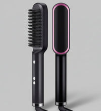 Black hair straightening brush with pink accents on a dark purple background