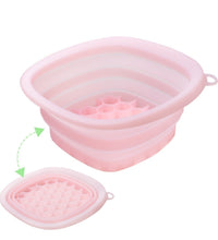Translucent pink folding ice basin on a white background