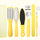 Set of yellow foot care tools including a file, scrubber, and other items on a white background.