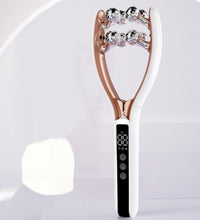 Beauty device with rose gold and white design on a light gray background