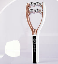 Beauty tool with rose gold design on a white background