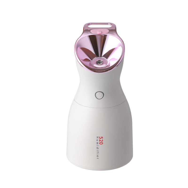 White and pink humidifier on a white background