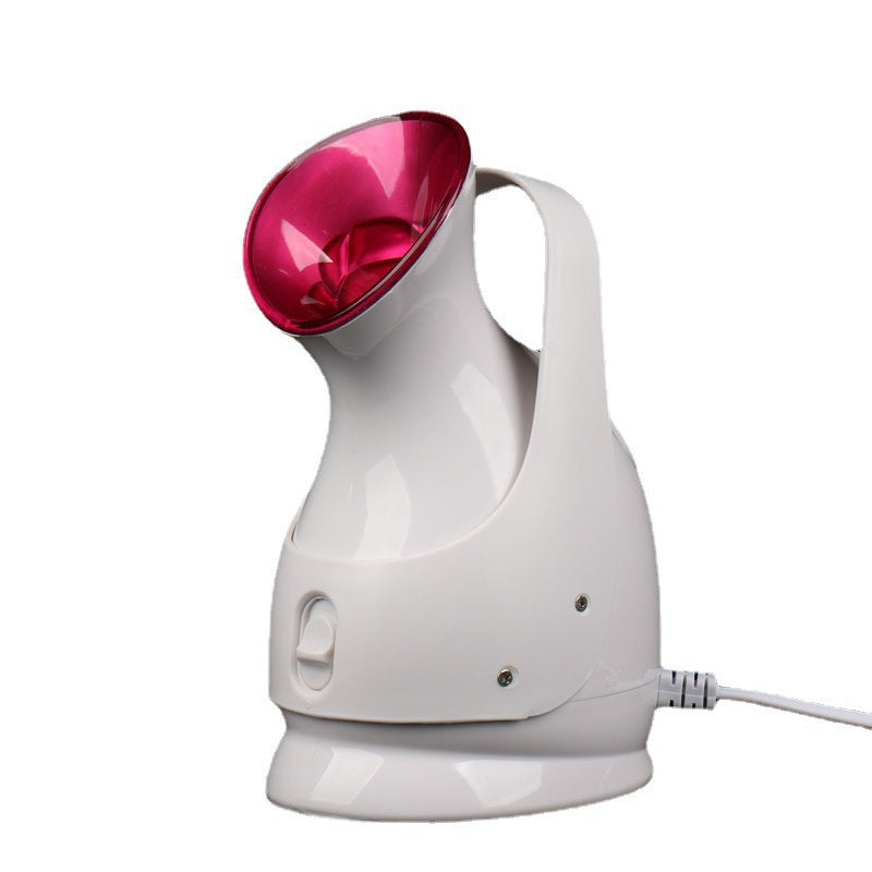 White handheld device with a red light on a white background