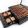 Makeup palette with various shades and brushes on a white background