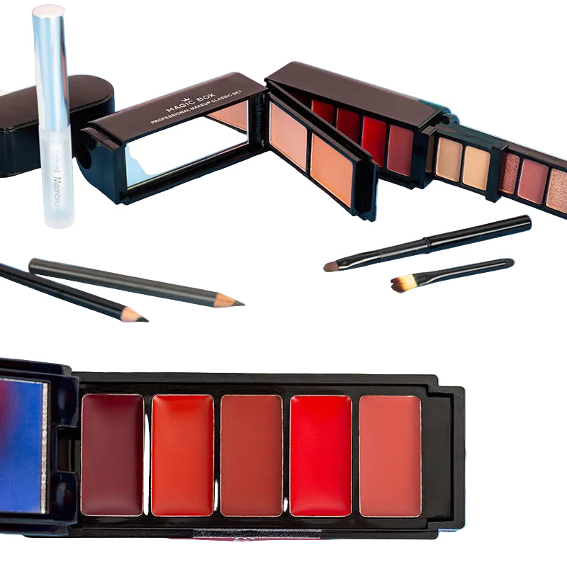 Makeup palettes with lipsticks and brushes on a blue surface