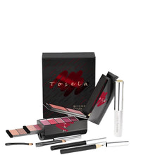 Makeup set with Tosela packaging on a white surface
