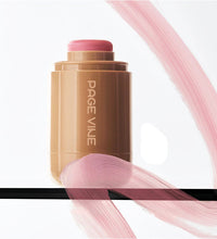 Makeup stick with pink cap and visible brand name on a white background