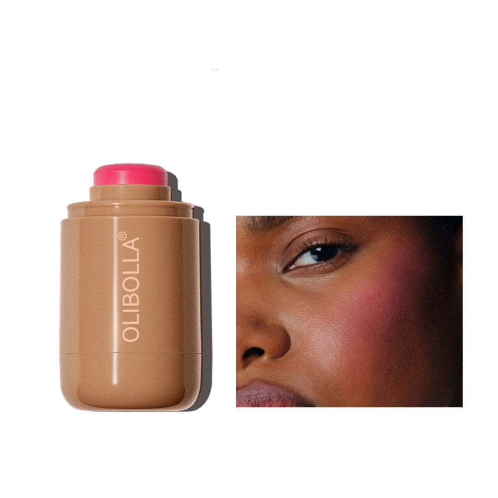 Olibella makeup stick with a close-up of a person wearing it on a white background