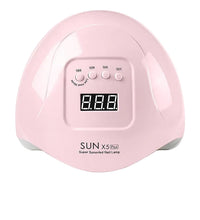 Pink nail lamp with digital display and UK-220V British plug on a white background