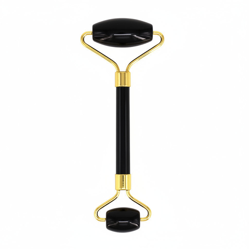 Glowing roller with black handle and gold accents on a white background