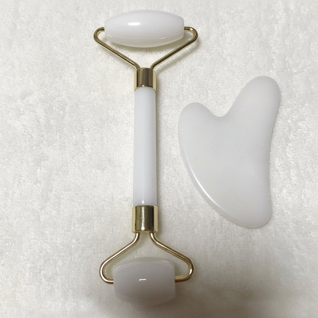 White double roller and scraping board on a textured white background