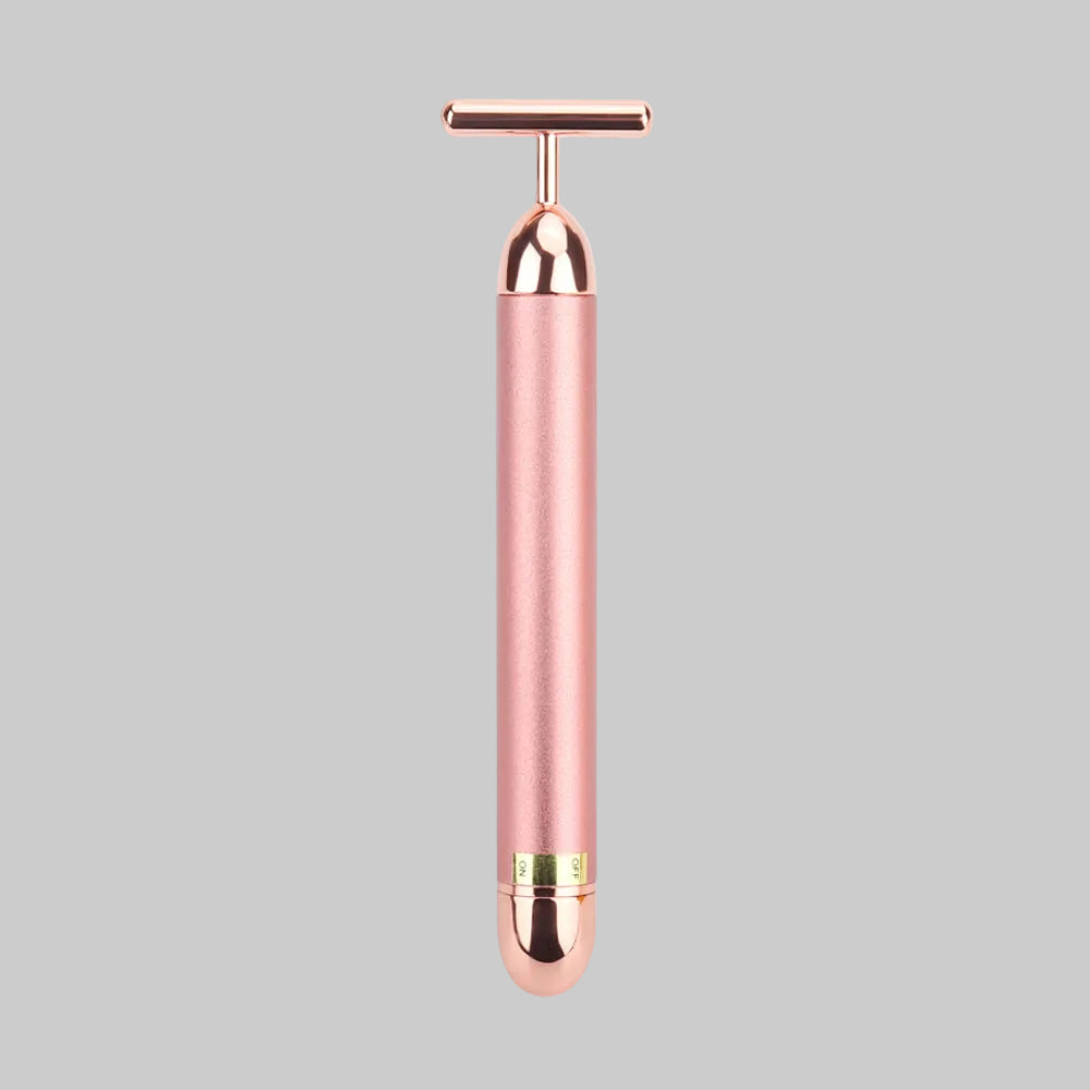 Rose gold handheld device on a white background