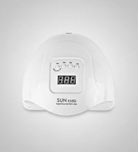 White nail lamp with digital display and UK-220V British plug on a white background