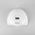 White nail lamp with digital display and Australian plug adapter on a white background
