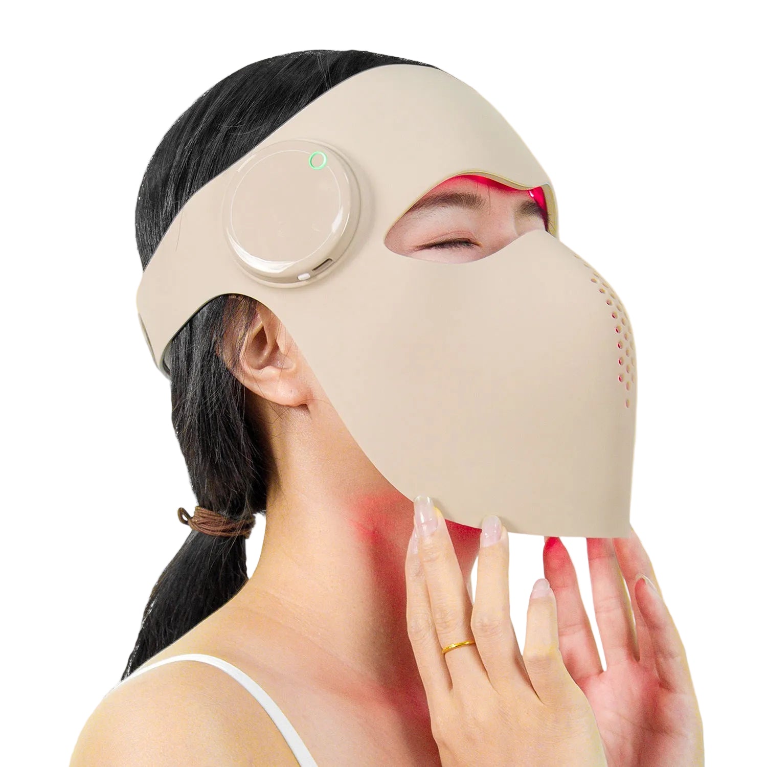 Close up of the at-home photonic facial beauty device in skin tone color
