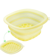 Yellow folding ice basin with transparent yellow interior on a white background