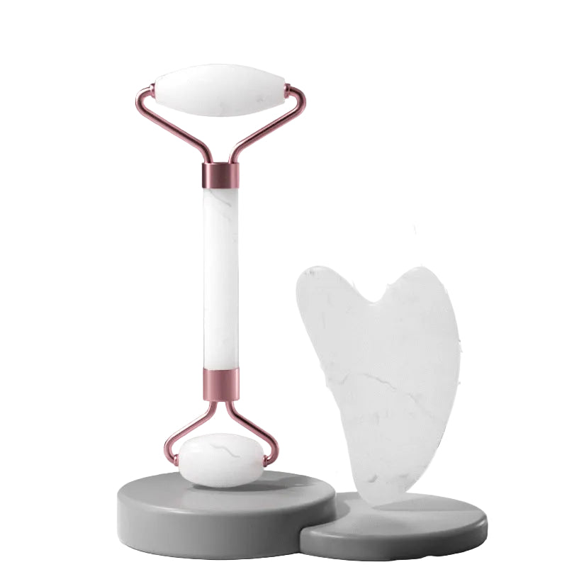 Professional grade facial massager set including a roller and scraping board.
