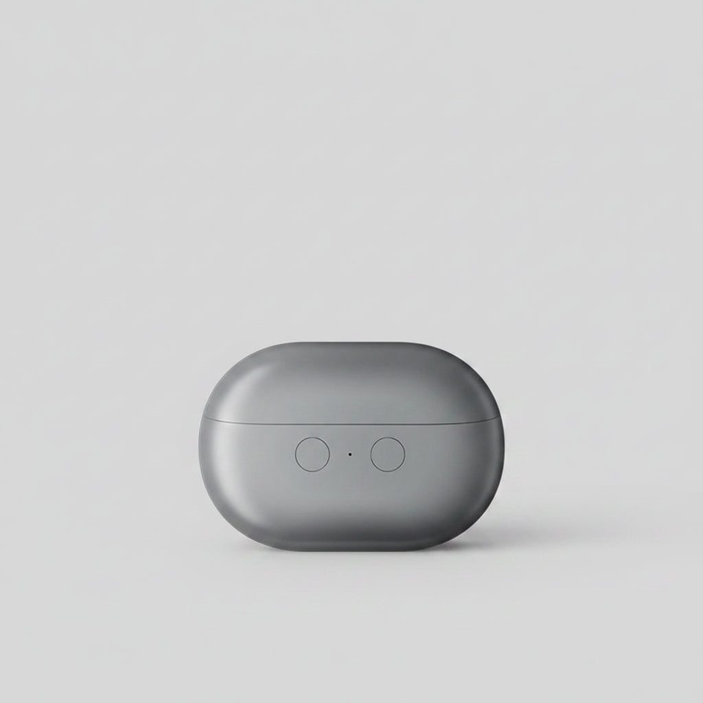 Gray electronic device on a white surface with text about shock absorption and noise reduction.