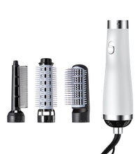 Ergonomic matte red handle of the hair styler featuring easy-to-use power and heat adjustment sliders.