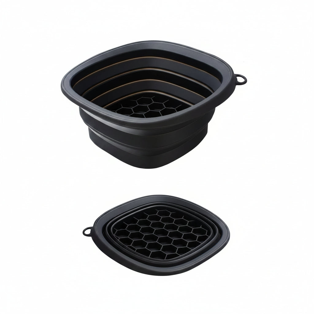 Collapsible black silicone trivet with measurements and folding illustration on a white background