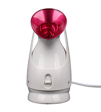 White and pink lamp with a black background