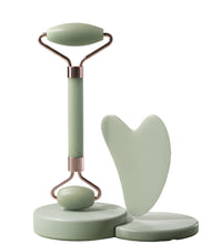 Contoured quartz gua sha plate for gentle facial muscle relaxation.