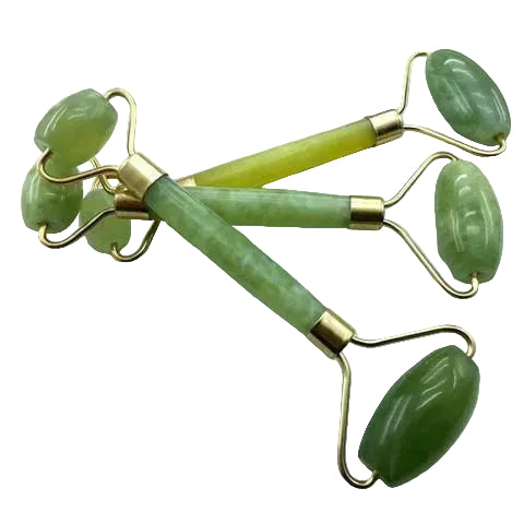 Green jade rollers with gold accents on a white background