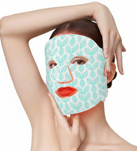 Person wearing a face mask with a blue background