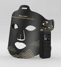 Black face mask with digital display on a white background