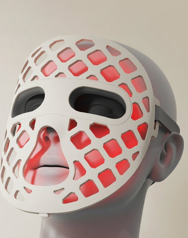 White mask with red grid pattern on a neutral background