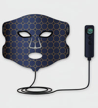 Facial mask with honeycomb pattern and digital controller on a white background