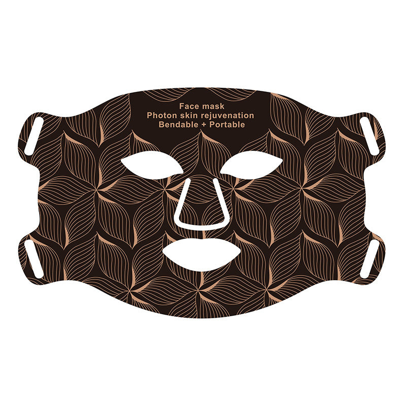 Face mask with leaf pattern on a white background