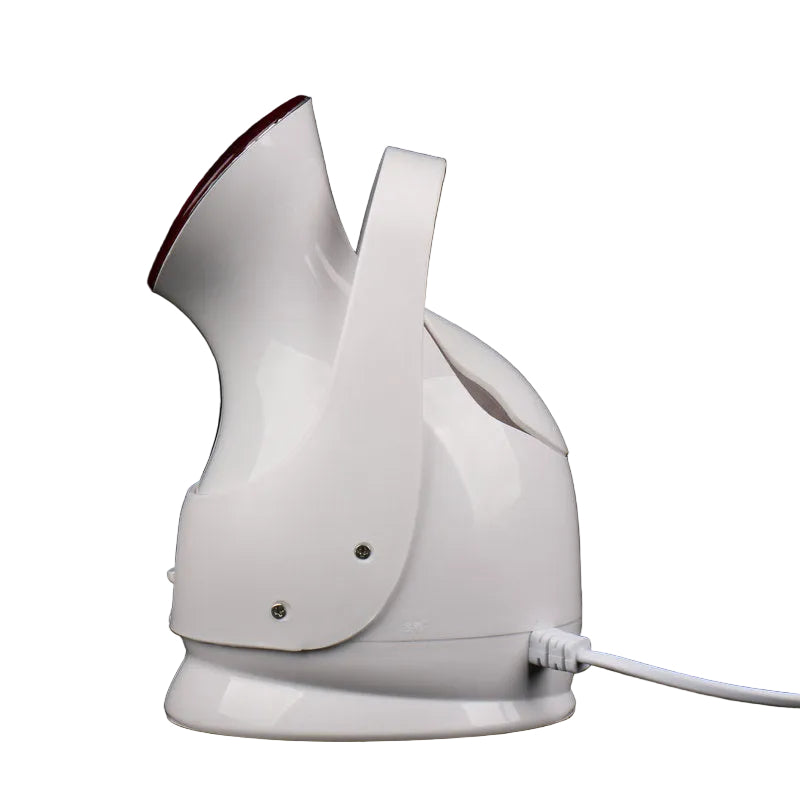 White handheld steamer on a black background