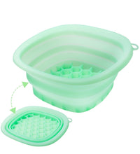 Green folding ice basin with transparent lid on a white background