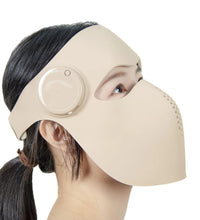 Woman relaxing while wearing the red LED skin rejuvenation mask