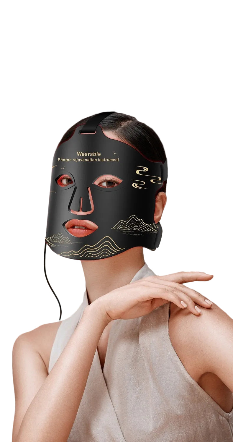 Person wearing a black face mask with text on a dark background