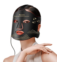 Person wearing a black face mask with text on a dark background
