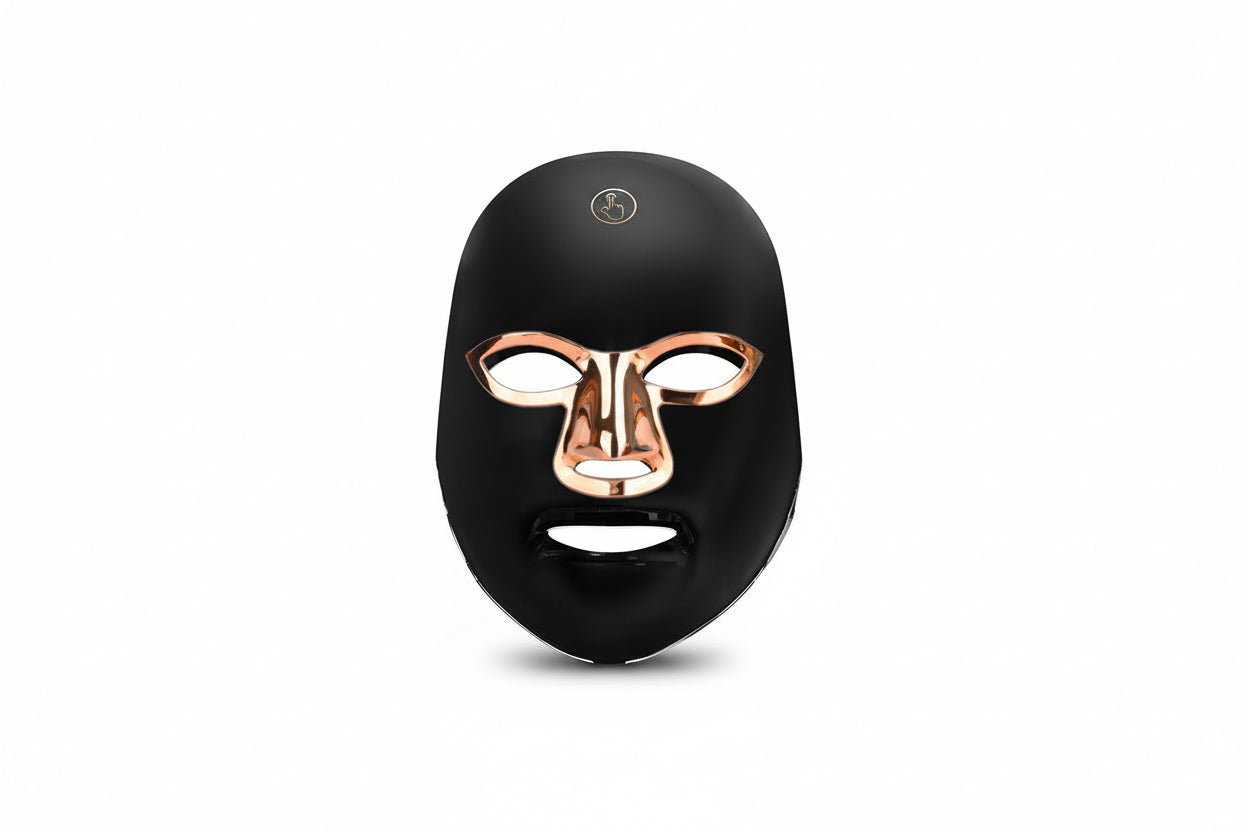 Black mask with rose gold accents on a white background