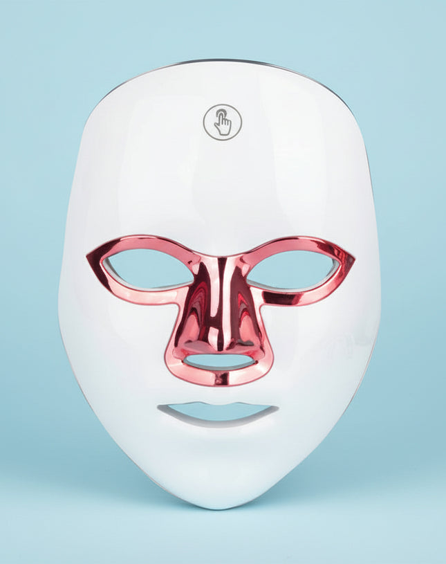 White LED face mask with red accents on a white background