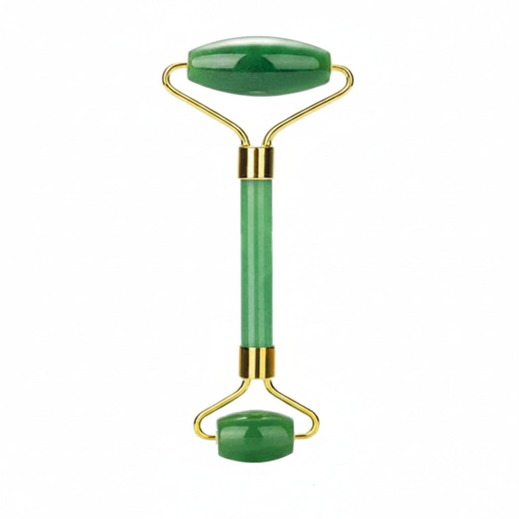 Jade facial roller with gold accents on a white background