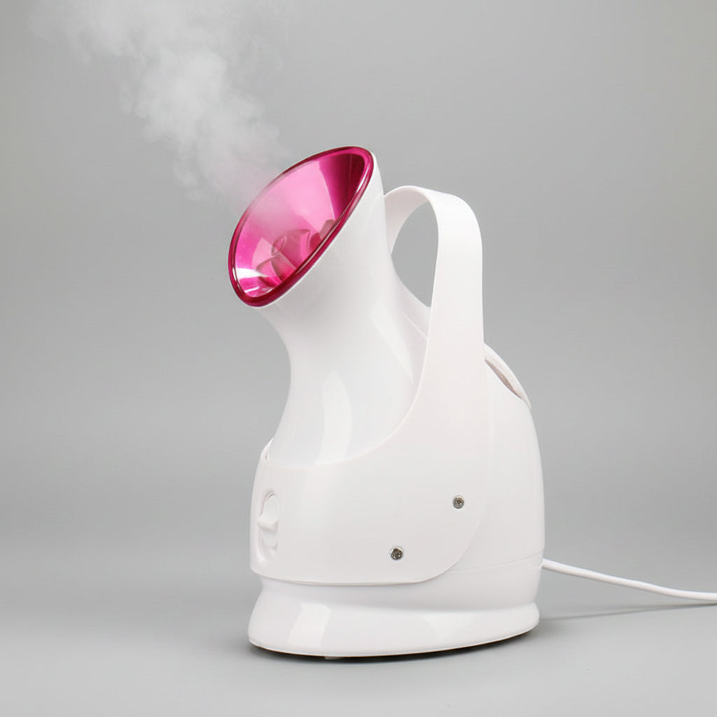 White handheld steamer with pink top emitting steam on a black background
