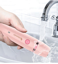 Close-up of the interchangeable precision heads for the women's electric hair removal tool.